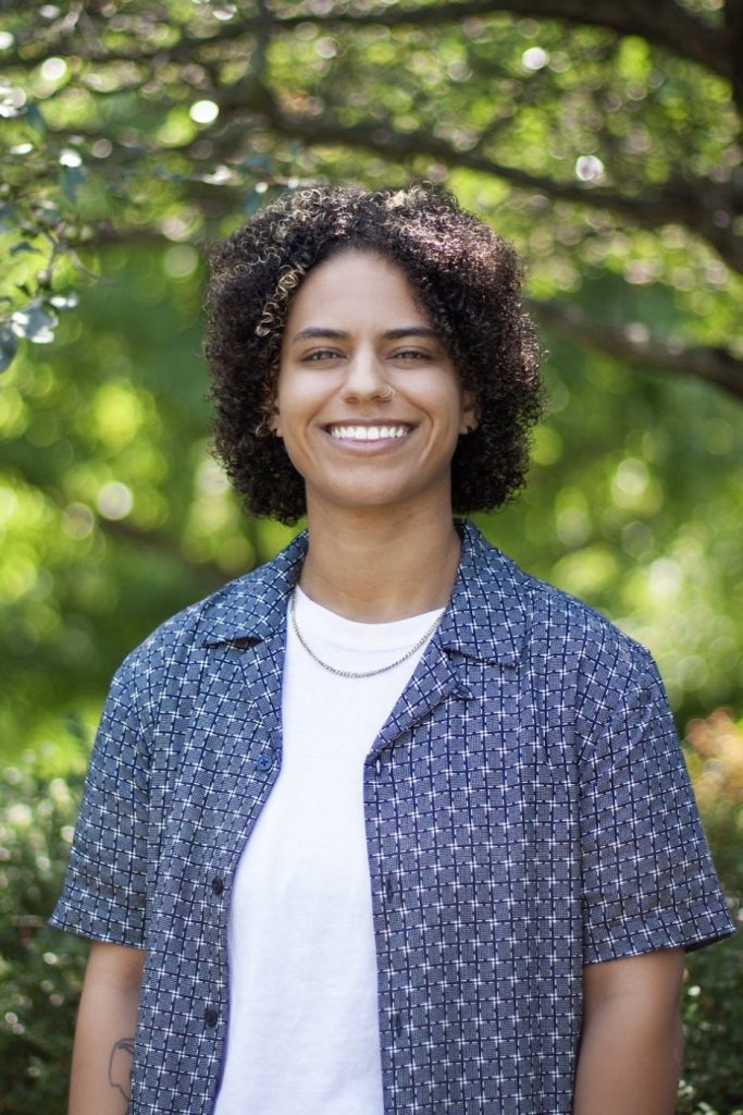 Professional headshot of Amina J. 